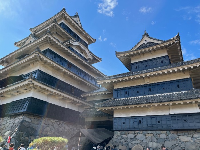 Castle closeup featuring its dark exterior and five tiers