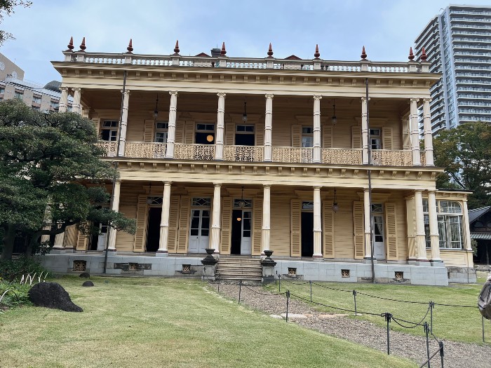 Back side of the residence with dual columned walkways