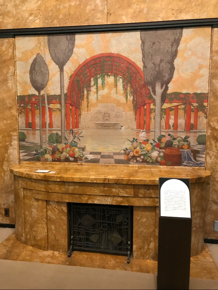Dining room fireplace with gorgeous background mural